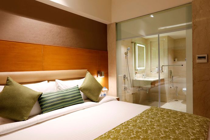Imagen de la habitación del Hotel Nataraj Sarovar Portico Jhansi. Foto 7