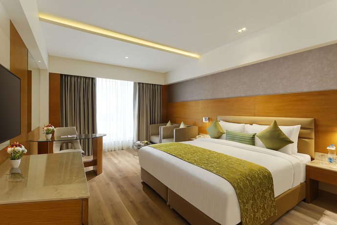 Imagen de la habitación del Hotel Nataraj Sarovar Portico Jhansi. Foto 11