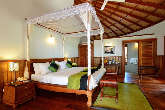 Imagen de la habitación del Hotel Nataya Roundhouse Coral Bay Resort and Spa. Foto 12