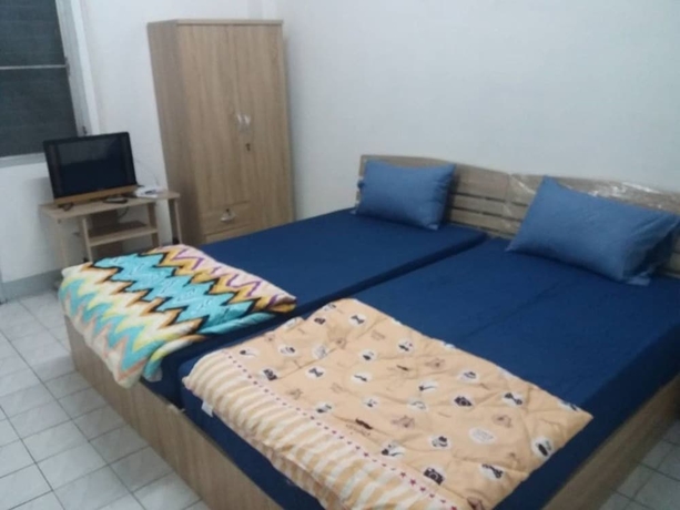 Imagen de la habitación del Hotel Natcha Place Thammasat Rangsit. Foto 7