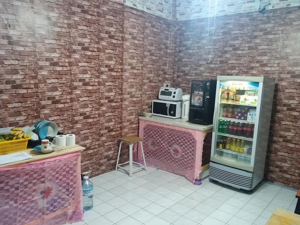 Imagen del bar/restaurante del Hotel Natcha Place Thammasat Rangsit. Foto 6