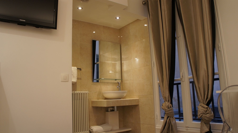 Imagen de la habitación del Hotel Nation Montmartre. Foto 10