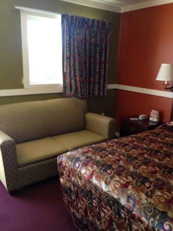 Imagen de la habitación del Hotel National 9 Inn Farmington. Foto 3