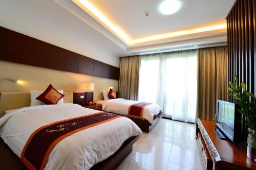Imagen de la habitación del Hotel National Convention Center Resort. Foto 8