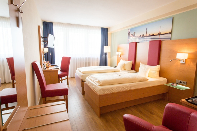 Imagen de la habitación del Hotel National Düsseldorf. Foto 6
