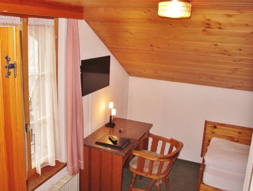 Imagen de la habitación del Hotel National, FRUTIGEN. Foto 9