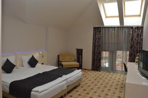 Imagen de la habitación del Hotel National Palace. Foto 10