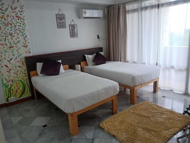 Imagen de la habitación del Hotel Natol Homestay-Riverbank Suites. Foto 7