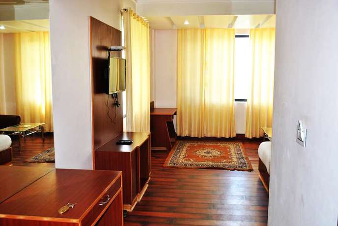 Imagen de la habitación del Hotel Natraj International. Foto 11