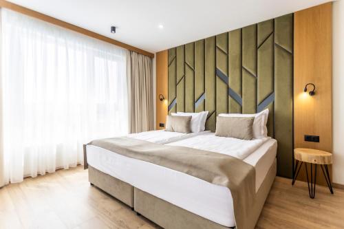 Imagen de la habitación del Hotel Natura All Seasons Boutique. Foto 15