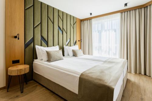 Imagen de la habitación del Hotel Natura All Seasons Boutique. Foto 18