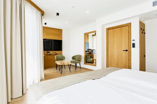 Imagen general del Hotel Natura All Seasons Boutique. Foto 11