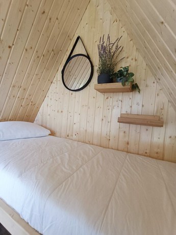 Imagen de la habitación del Hotel Natura Fun House and Camping. Foto 13