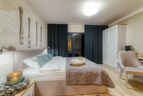 Imagen de la habitación del Hotel Natura Mierzei 30. Foto 3