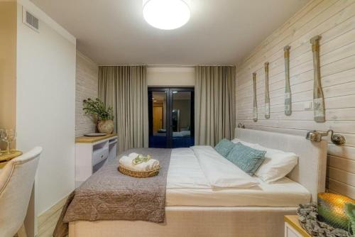 Imagen de la habitación del Hotel Natura Mierzei 30. Foto 4
