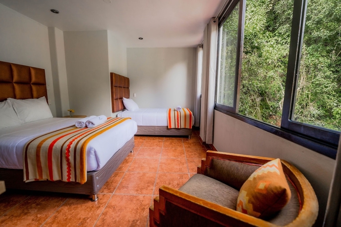 Imagen de la habitación del Hotel NaturaLodge Machu Picchu. Foto 2