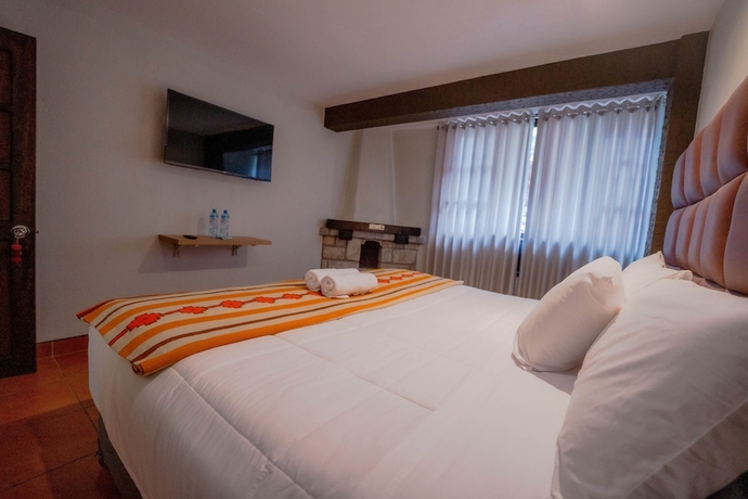 Imagen de la habitación del Hotel NaturaLodge Machu Picchu. Foto 9