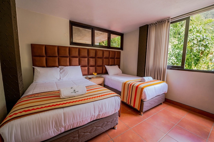Imagen de la habitación del Hotel NaturaLodge Machu Picchu. Foto 11