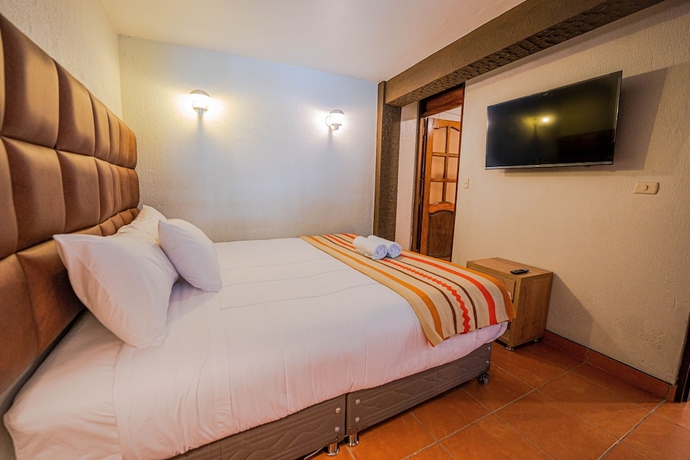 Imagen de la habitación del Hotel NaturaLodge Machu Picchu. Foto 12