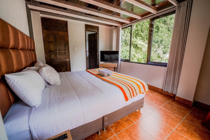 Imagen de la habitación del Hotel NaturaLodge Machu Picchu. Foto 14
