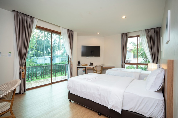 Imagen de la habitación del Hotel Natural Beach Resort. Foto 9