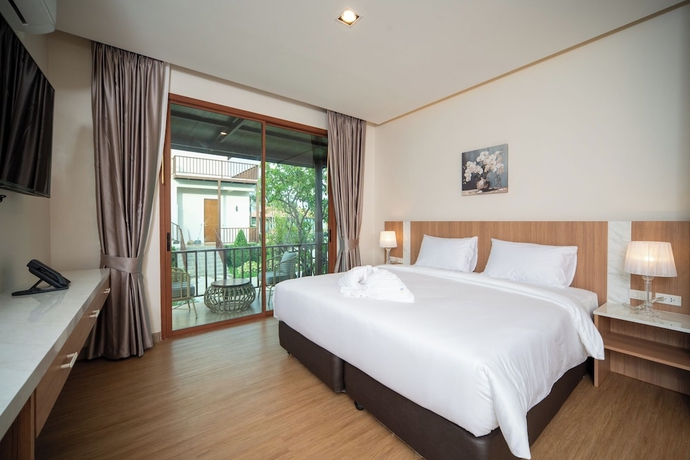 Imagen de la habitación del Hotel Natural Beach Resort. Foto 15