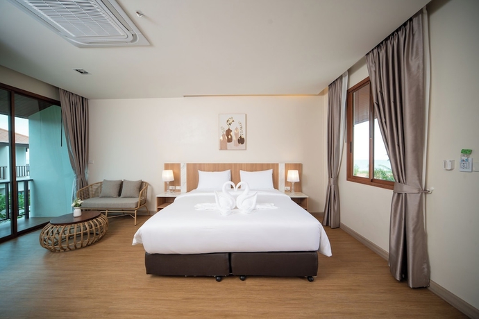 Imagen de la habitación del Hotel Natural Beach Resort. Foto 16