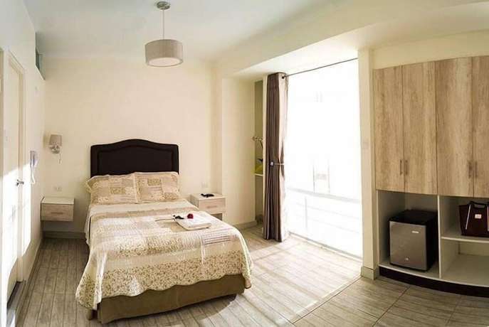 Imagen de la habitación del Hotel Natural Green Lounge. Foto 9