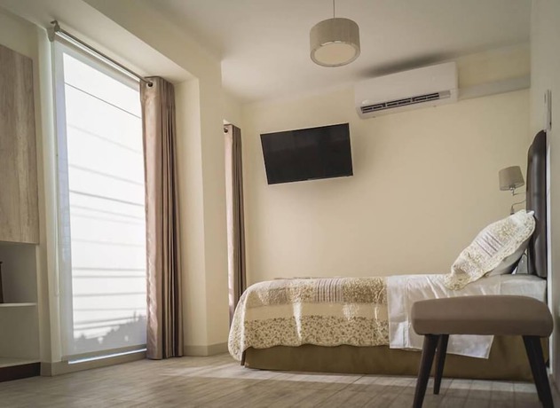 Imagen de la habitación del Hotel Natural Green Lounge. Foto 12