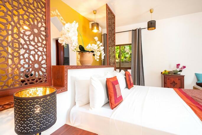 Imagen de la habitación del Hotel Natural Kendwa Villa. Foto 11