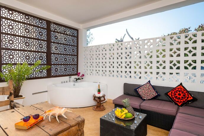 Imagen de la habitación del Hotel Natural Kendwa Villa. Foto 19