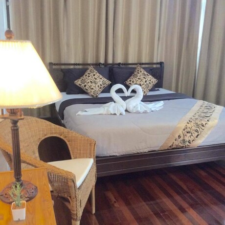 Imagen de la habitación del Hotel Naturbliss Resort Village. Foto 18