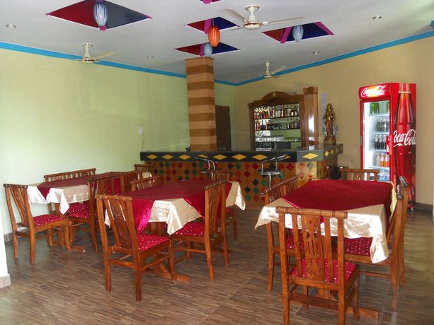 Imagen del bar/restaurante del Hotel Nature Bloom Dharamshala and Resort. Foto 3