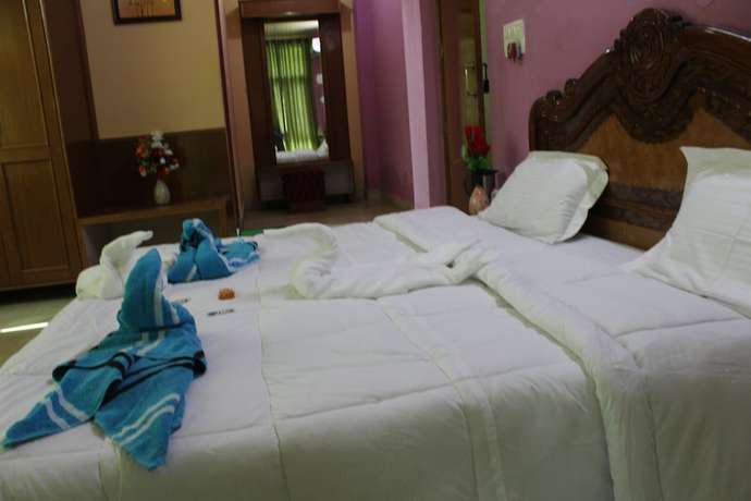 Imagen de la habitación del Hotel Nature Bloom Dharamshala and Resort. Foto 9