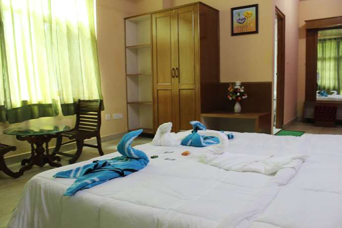 Imagen de la habitación del Hotel Nature Bloom Dharamshala and Resort. Foto 12