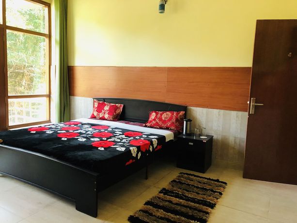 Imagen de la habitación del Hotel Nature Bloom Dharamshala and Resort. Foto 17