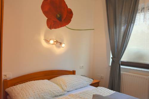 Imagen de la habitación del Hotel Nature Lukanc Bled. Foto 11