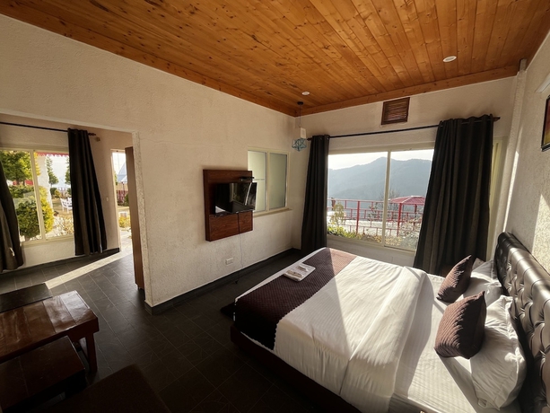 Imagen de la habitación del Hotel Nature Nest Eco Resort. Foto 7