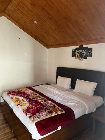 Imagen de la habitación del Hotel Nature Nest Eco Resort. Foto 9