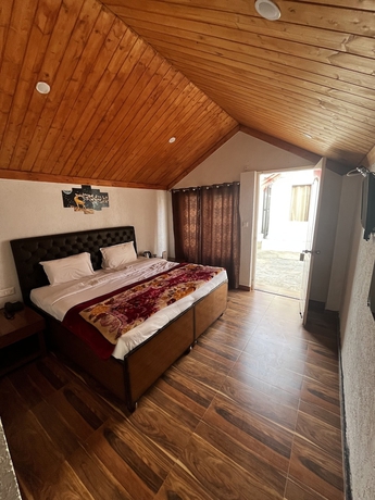 Imagen de la habitación del Hotel Nature Nest Eco Resort. Foto 10
