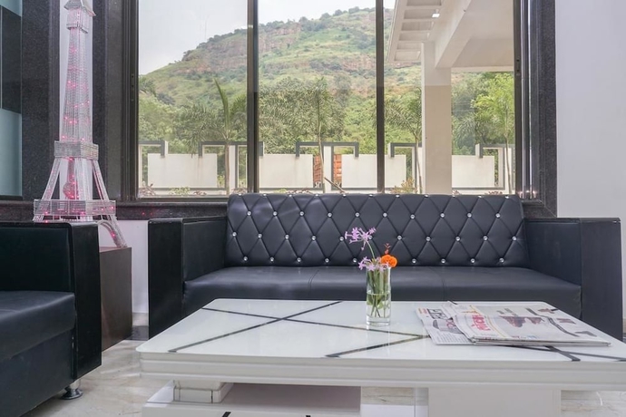 Imagen de los interiores del Hotel Nature Shield Lonavala. Foto 16