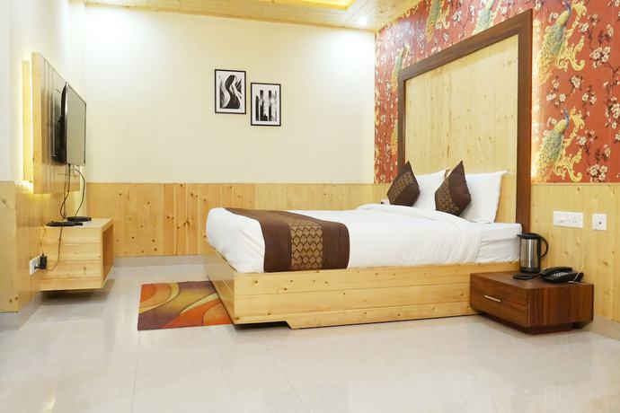 Imagen de la habitación del Hotel Nature Villa Resort. Foto 7