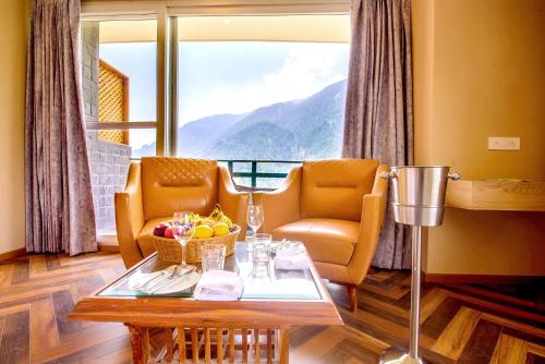 Imagen general del Hotel NatureVilas Sarovar Portico Manali. Foto 8