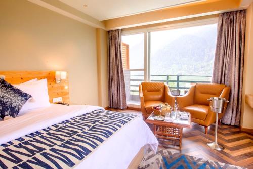Imagen general del Hotel NatureVilas Sarovar Portico Manali. Foto 9
