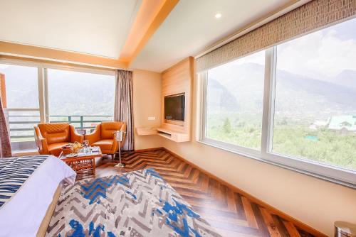 Imagen general del Hotel NatureVilas Sarovar Portico Manali. Foto 16