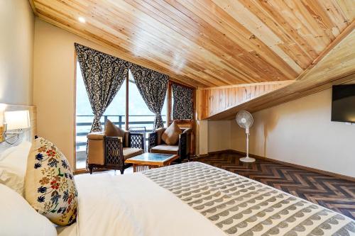 Imagen de la habitación del Hotel NatureVilas Sarovar Portico Manali. Foto 18