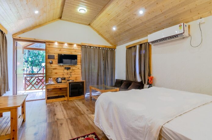 Imagen de la habitación del Hotel Natures Dreamland Holiday Resort. Foto 14
