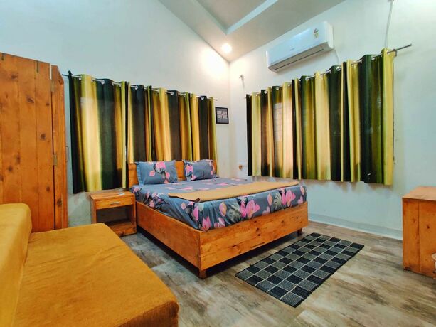 Imagen de la habitación del Hotel Natures Dreamland Holiday Resort. Foto 17