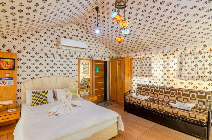 Imagen de la habitación del Hotel Natures Dreamland Holiday Resort. Foto 19