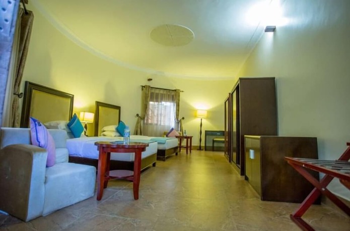 Imagen de la habitación del Hotel Nature's Green Beach Resort. Foto 21